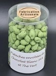 Pistaches enrobes de chocolat blanc 34% et th vert